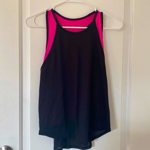 Cute black and pink workout top with a built in 2 layer material!